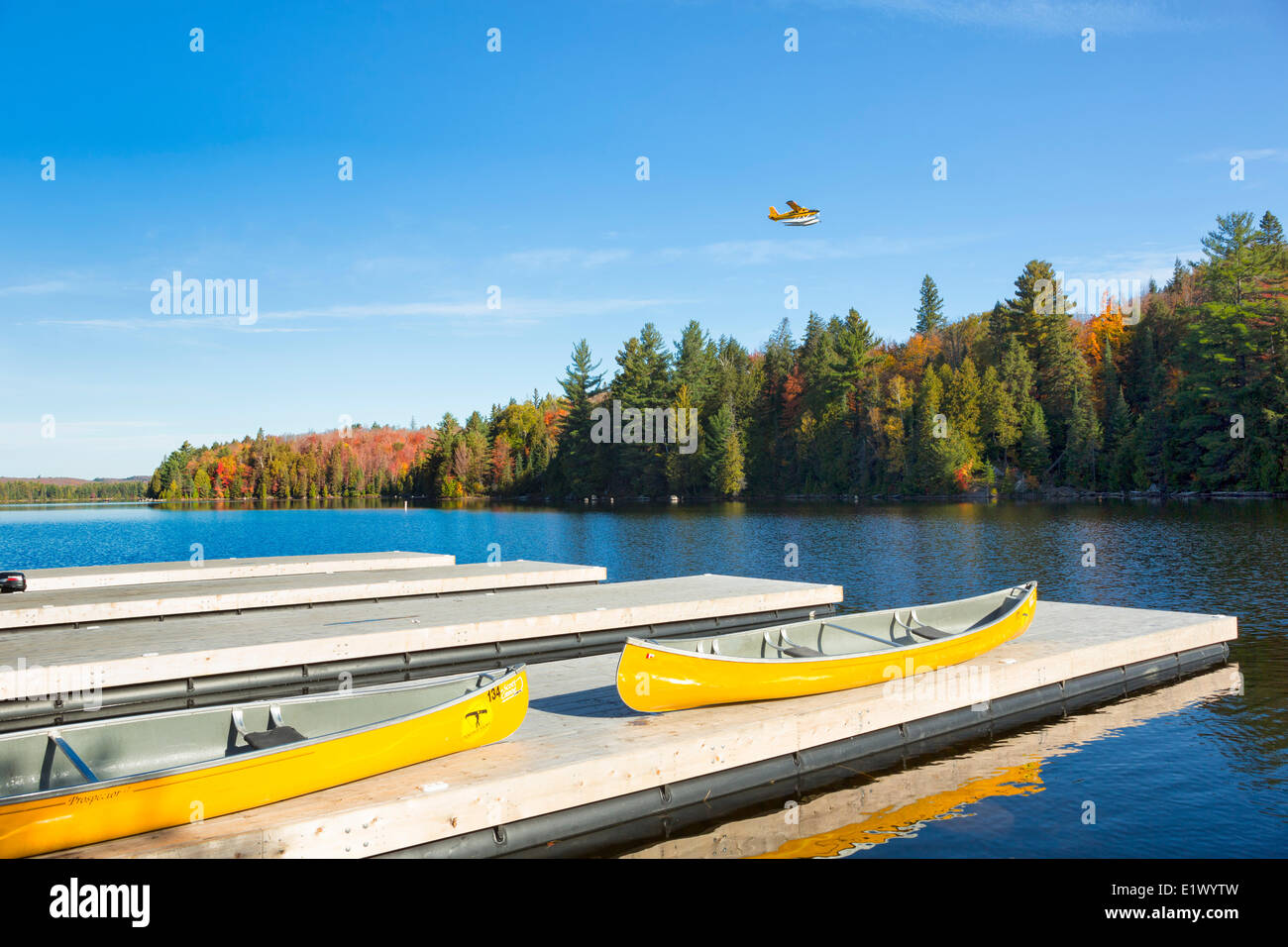 Canoes on dock, Canoe Lake, Algonquin Provincial Park, Ontario, Canada Stock Photo