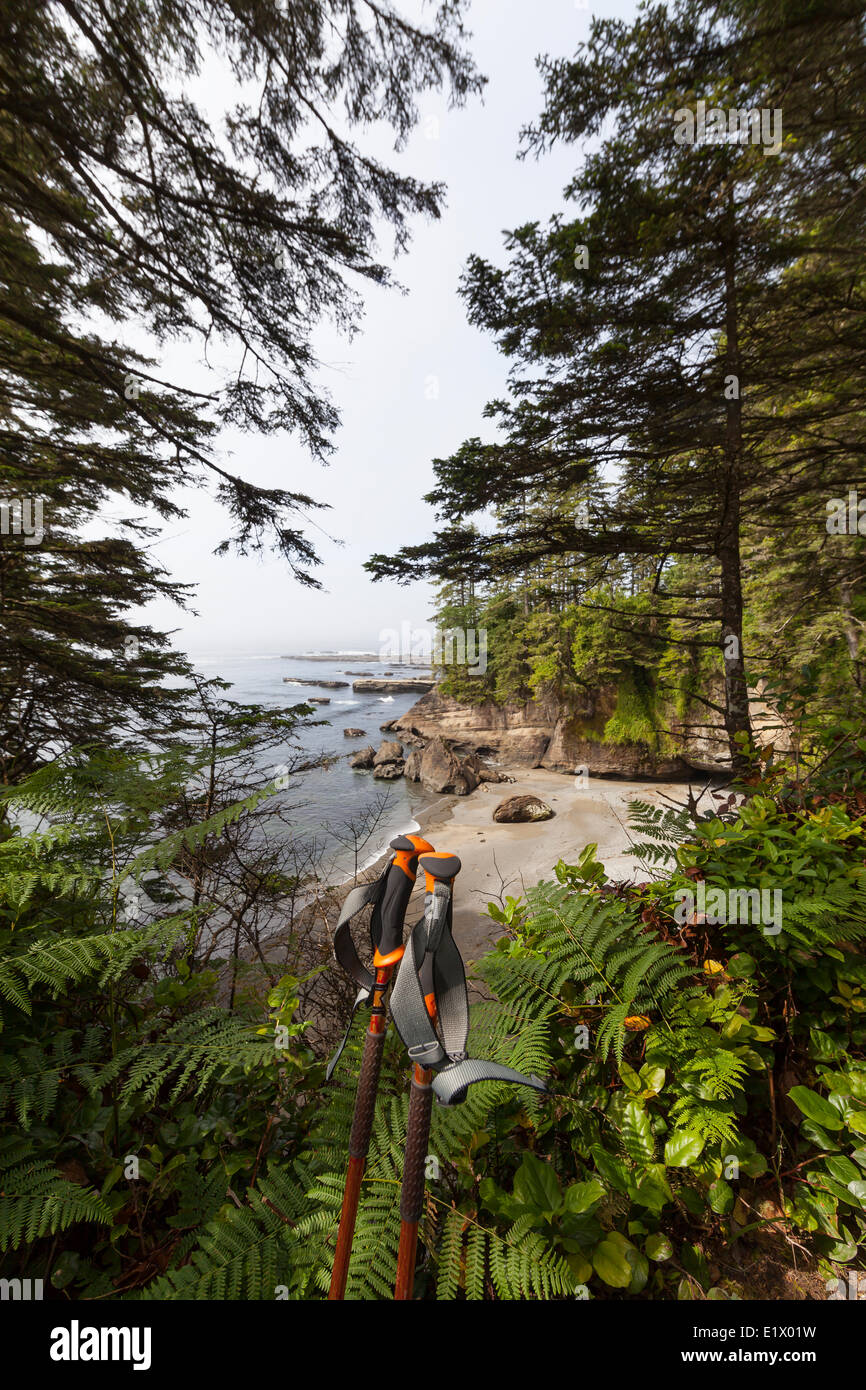 Hiking poles help frame a headland scenic along the West Coast Trail near Km 32 on the West Coast Trail.  West Coast Trail Stock Photo