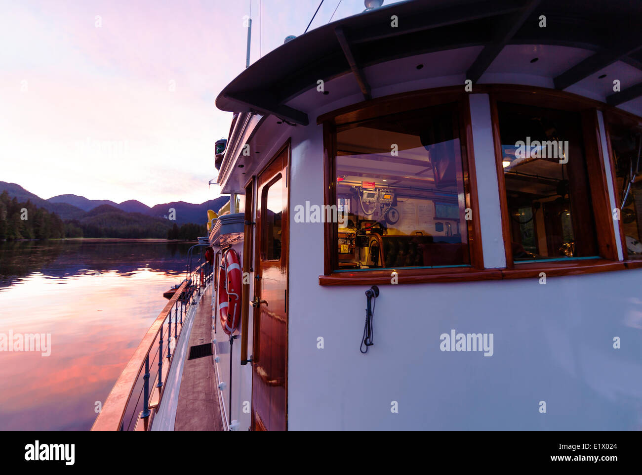 Columbia III at anchor for the evening while cruising through Mussel Inlet in the Great Bear Rainforest.  Fjordland Northern Stock Photo