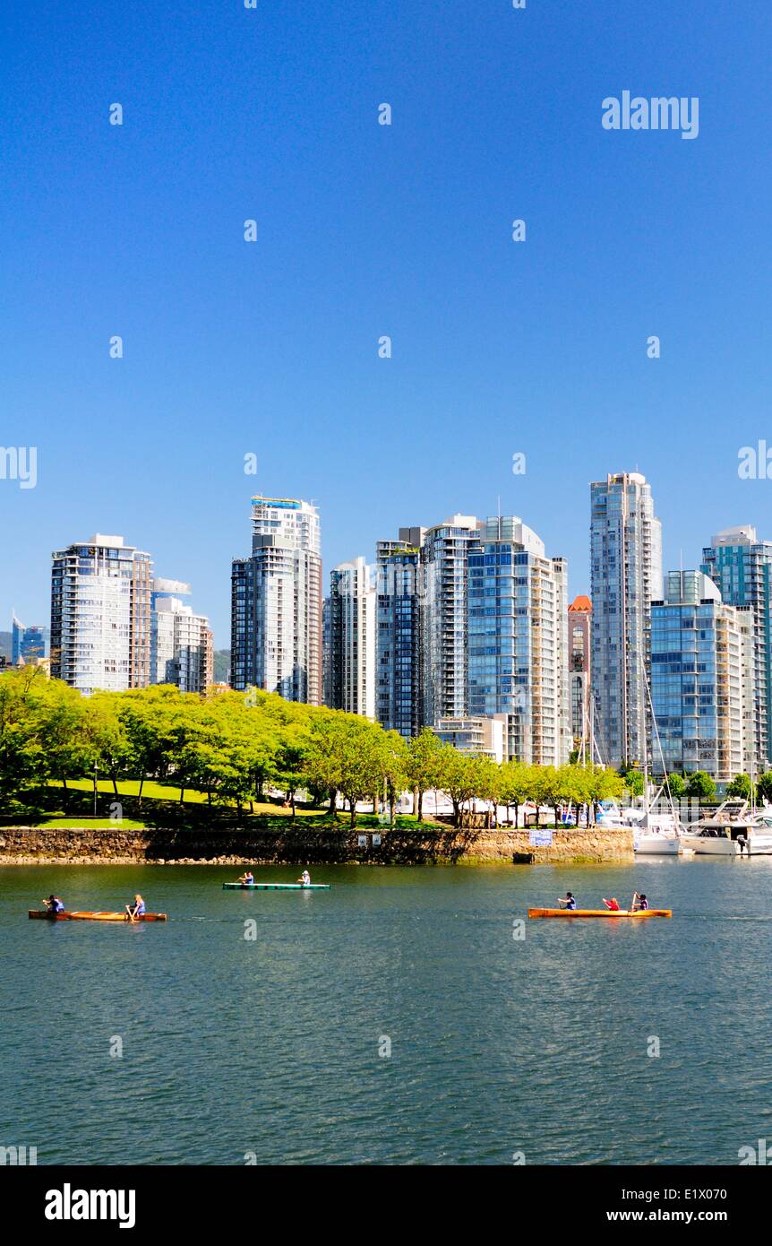 People canoeing near Ron Basford Park in False Creek in Vancouver, BC. Stock Photo