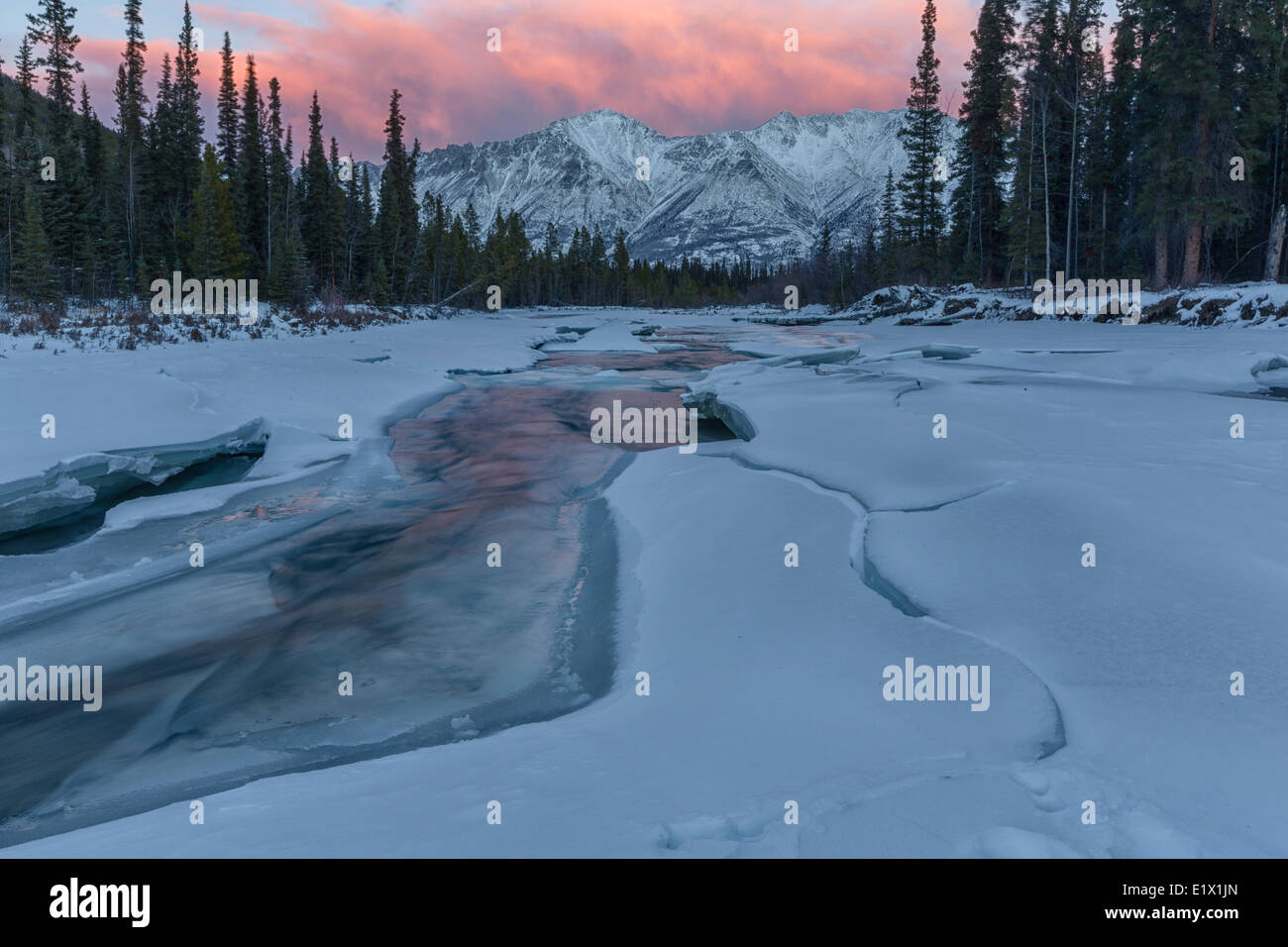 Pnk clouds at sunset over the Gray Ridge as the Wheaton River flows ...