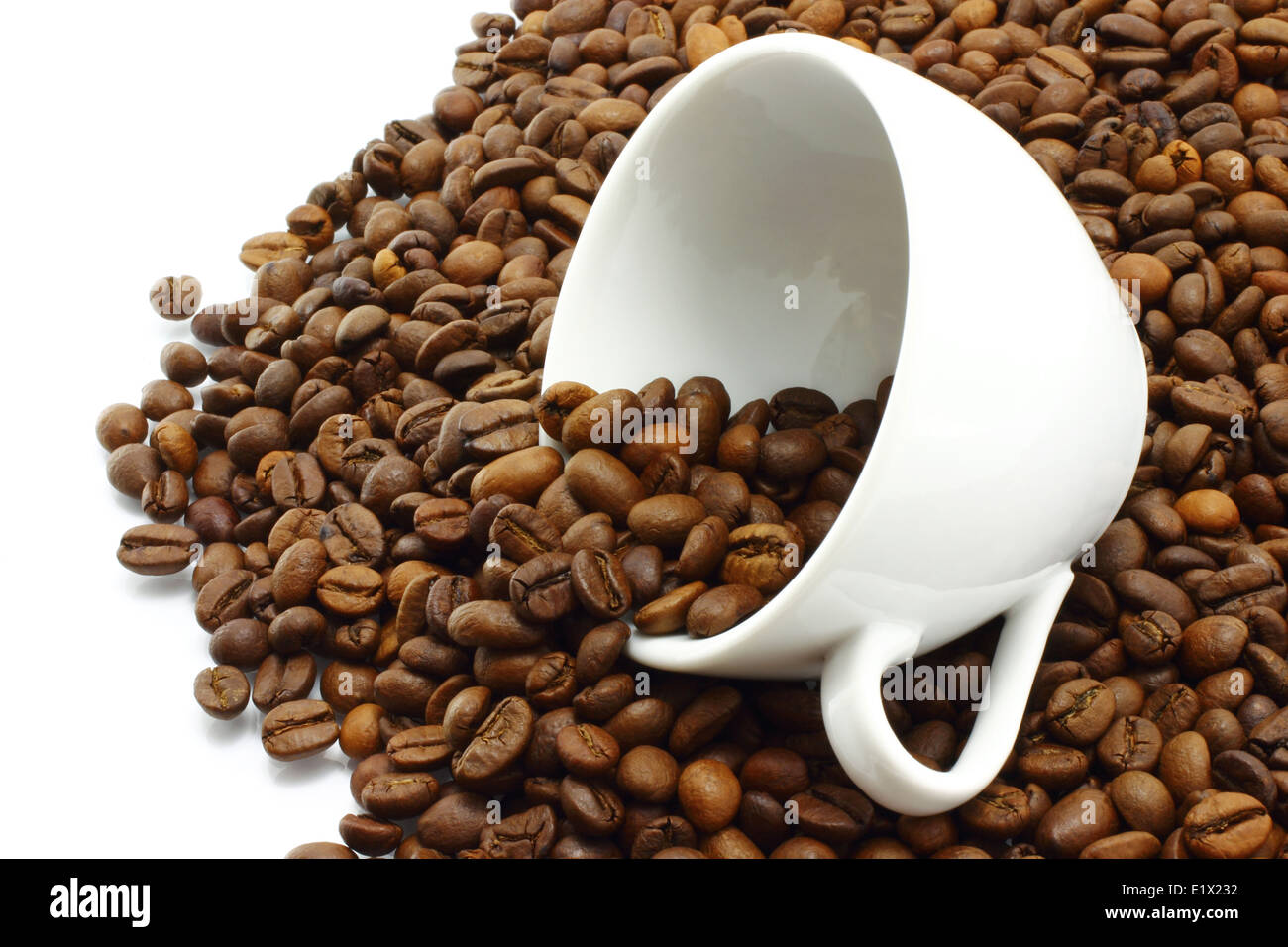 Coffee cup with coffee beans on a white background Stock Photo - Alamy