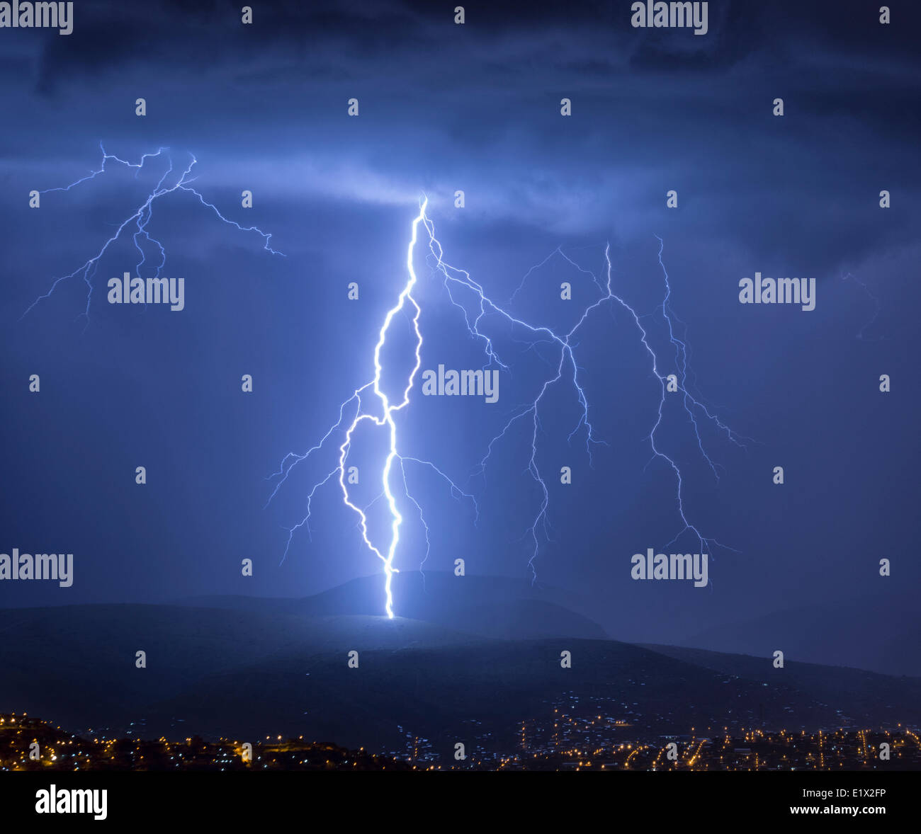 Lightning during a thunderstorm over the city of Cochabamba, Bolivia. Stock Photo