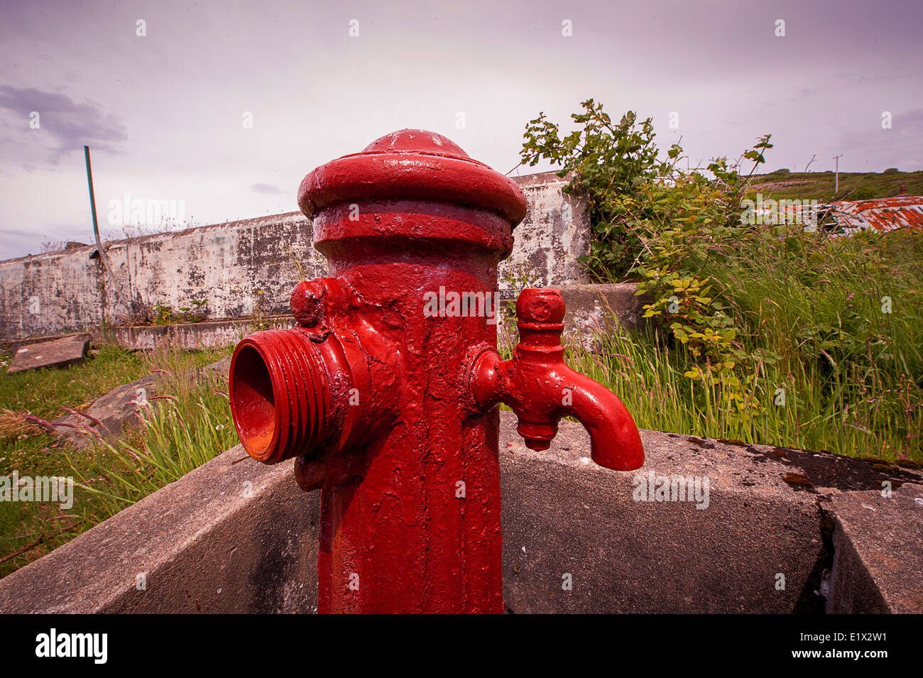 Red fire hydrant at Fort Dunree, Linsfort, County Donegal, Ireland Stock Photo
