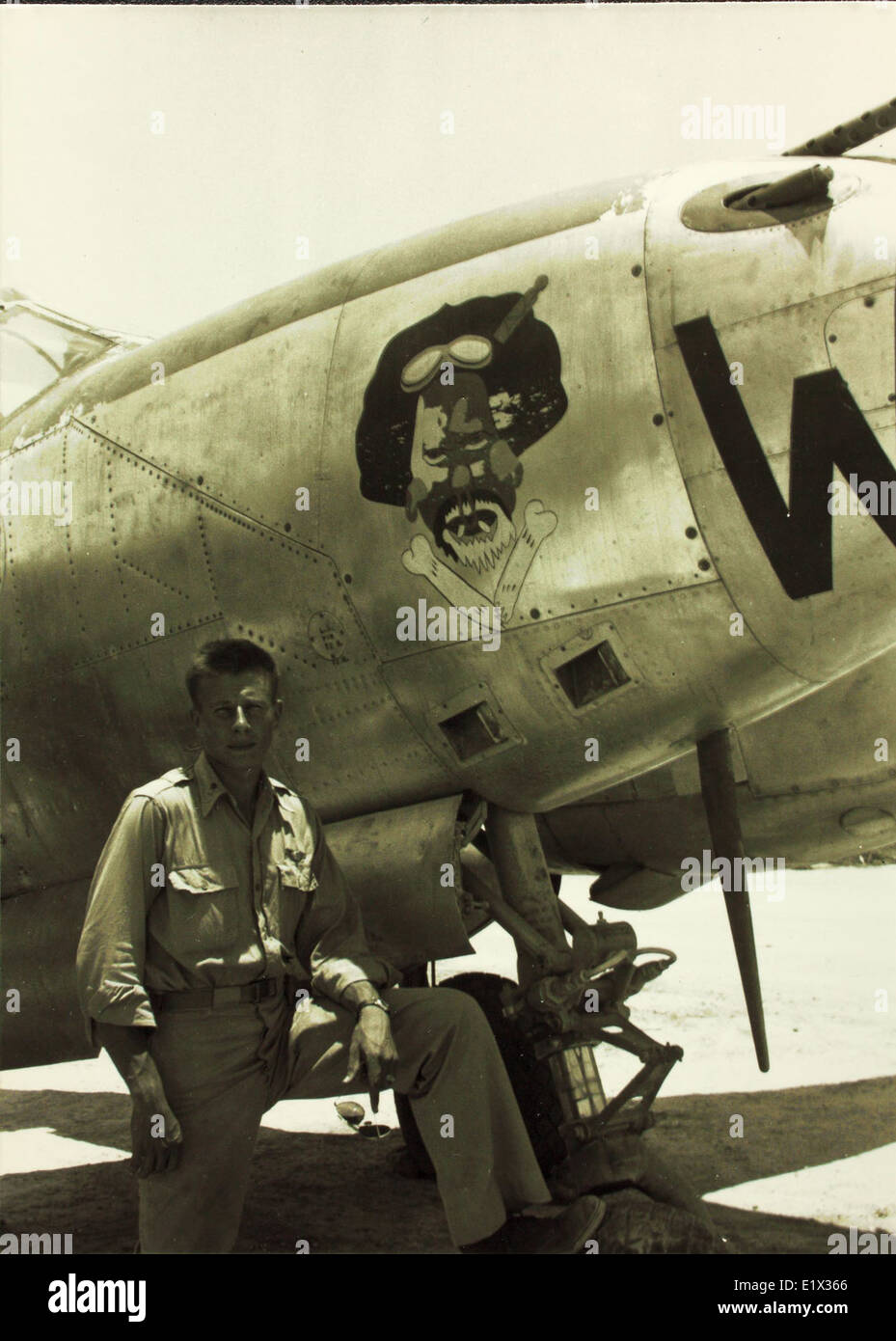 LT Bob Peters with a late model P-38 assigned to the 80th Fighter Squadron 'Headhunters,' 8th FG. Stock Photo