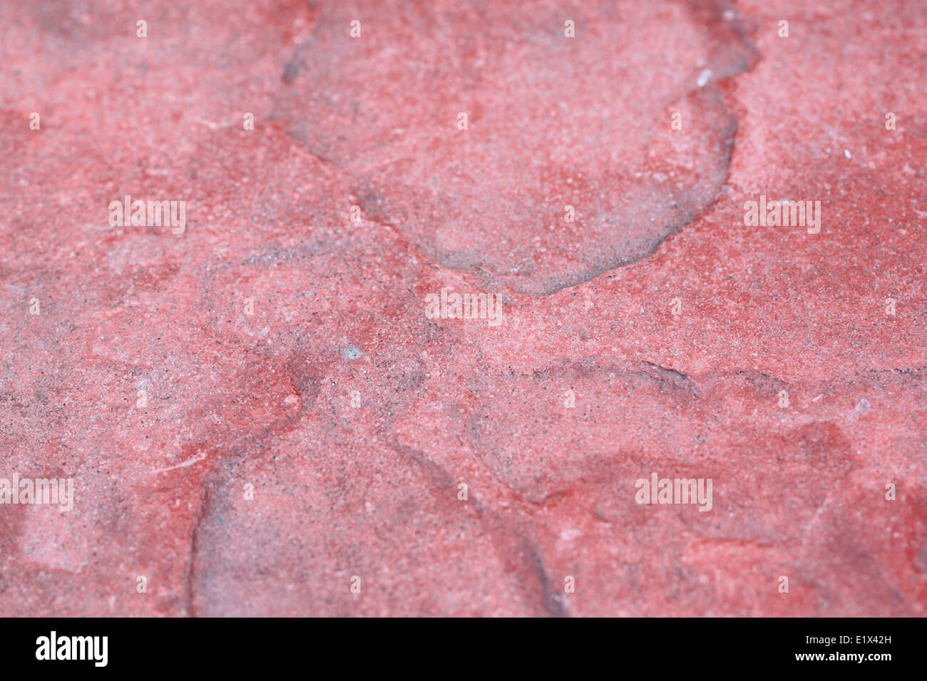 pattern slab of red stone for background. Stock Photo