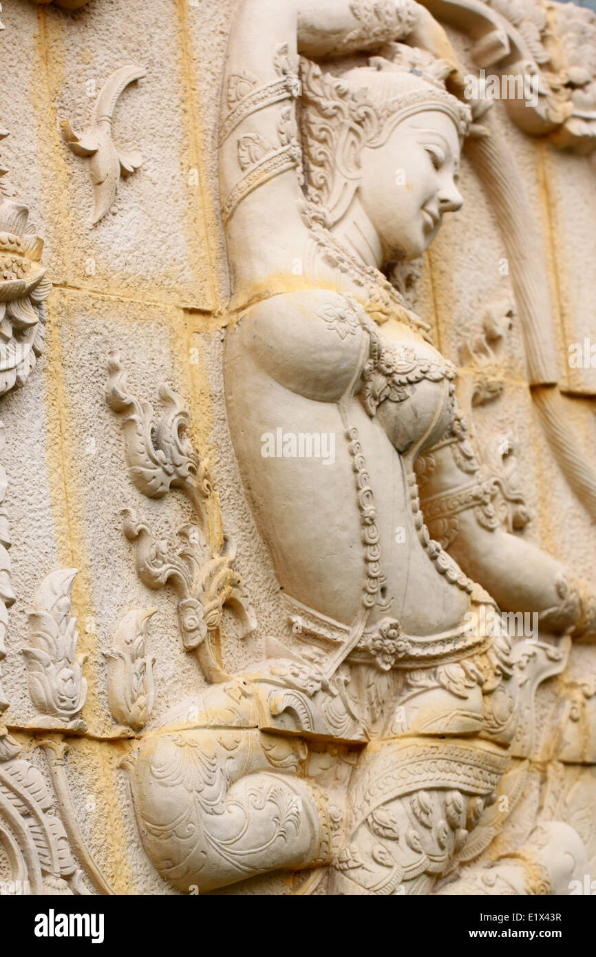 Goddess statue in Thai literature on house wall. Stock Photo