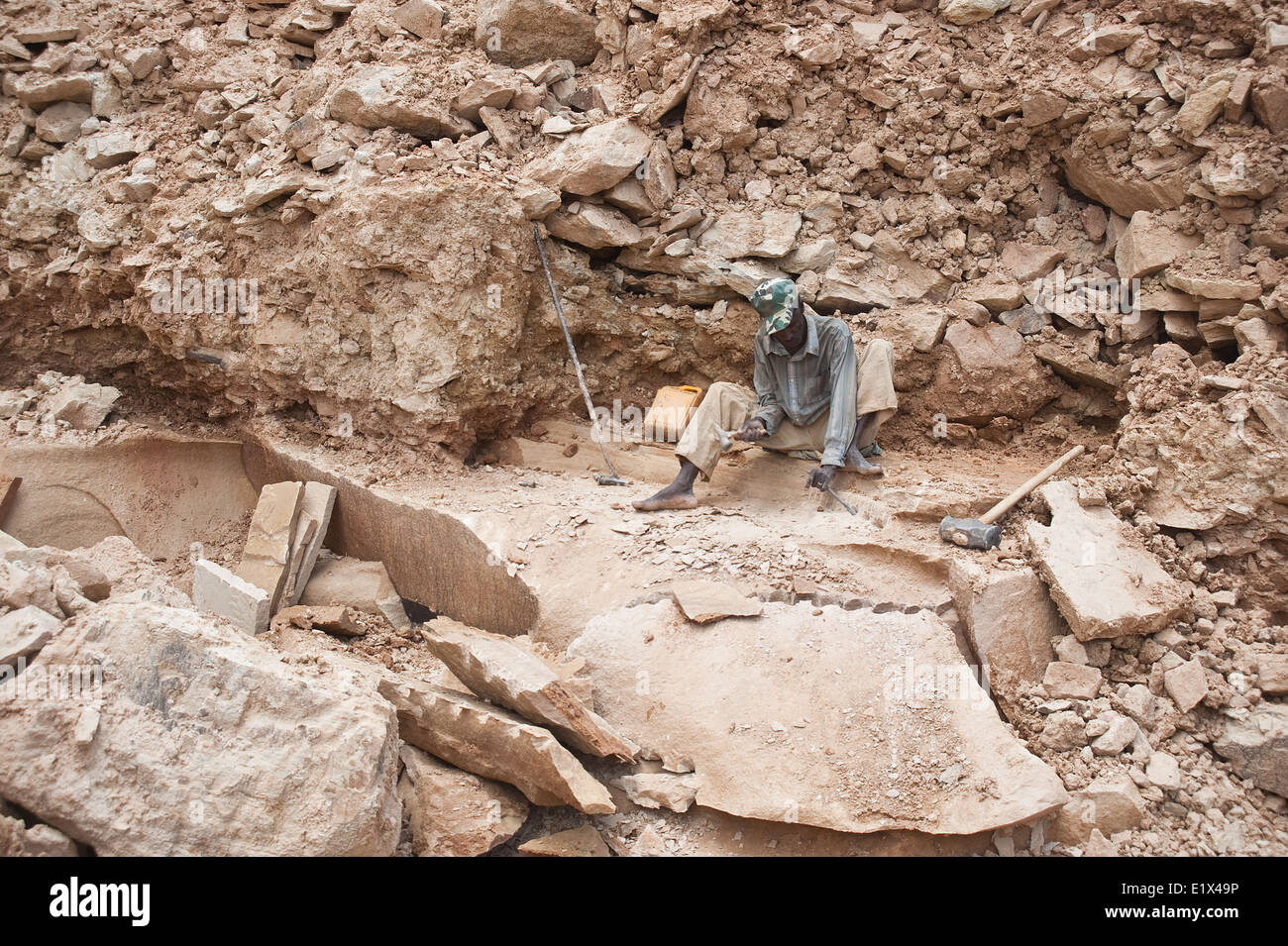 Worker in a sandstone quarry ( Ethiopia) Stock Photo