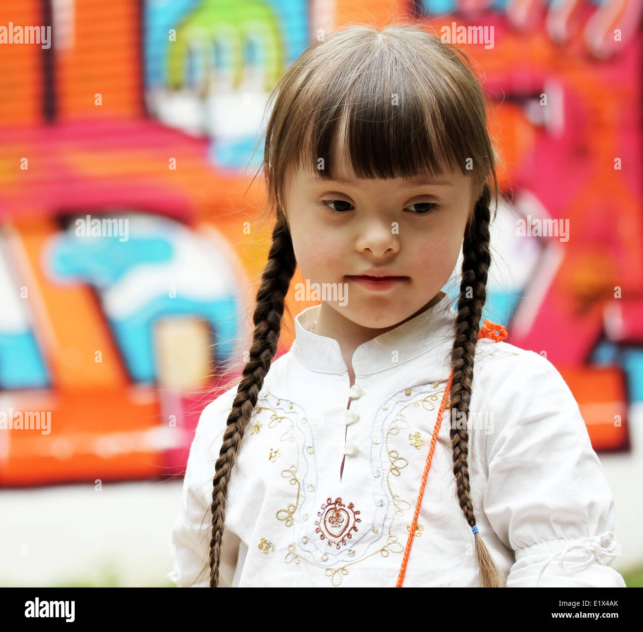 Portrait of beautiful young girl on the playground Stock Photo - Alamy