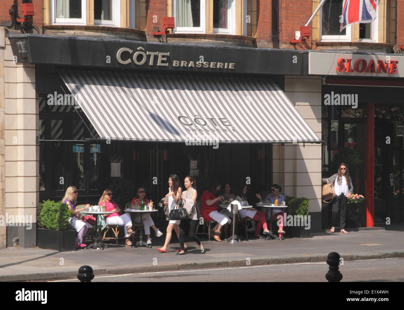 Cote Brasserie restaurant in Sloane Square Chelsea London Stock Photo -  Alamy