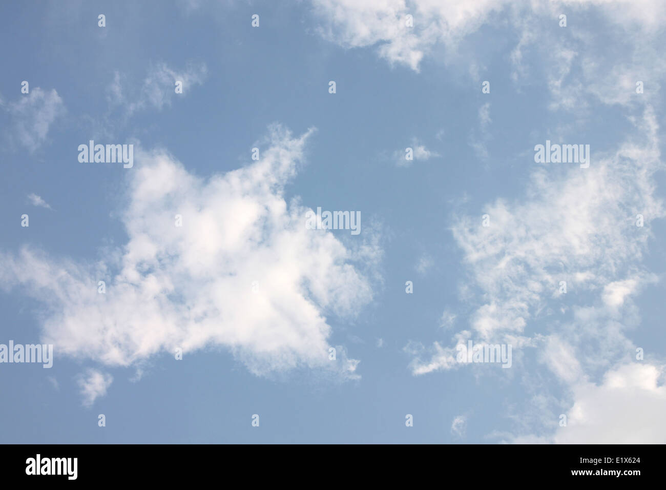 Blue sky and white clouds for background on a clear day. Stock Photo