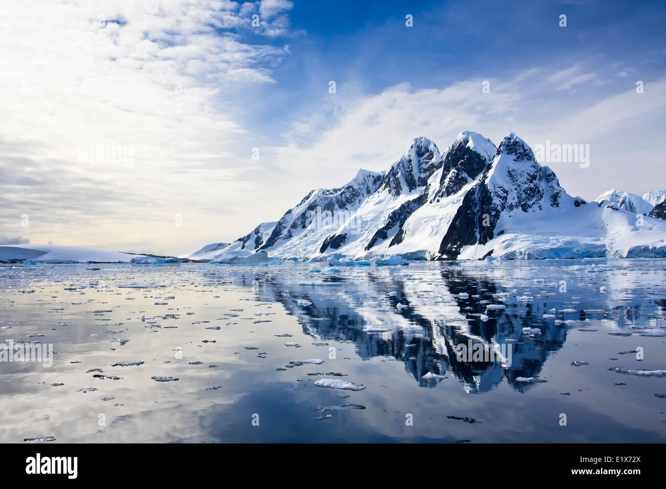 Beautiful snow-capped mountains against the blue sky Stock Photo - Alamy