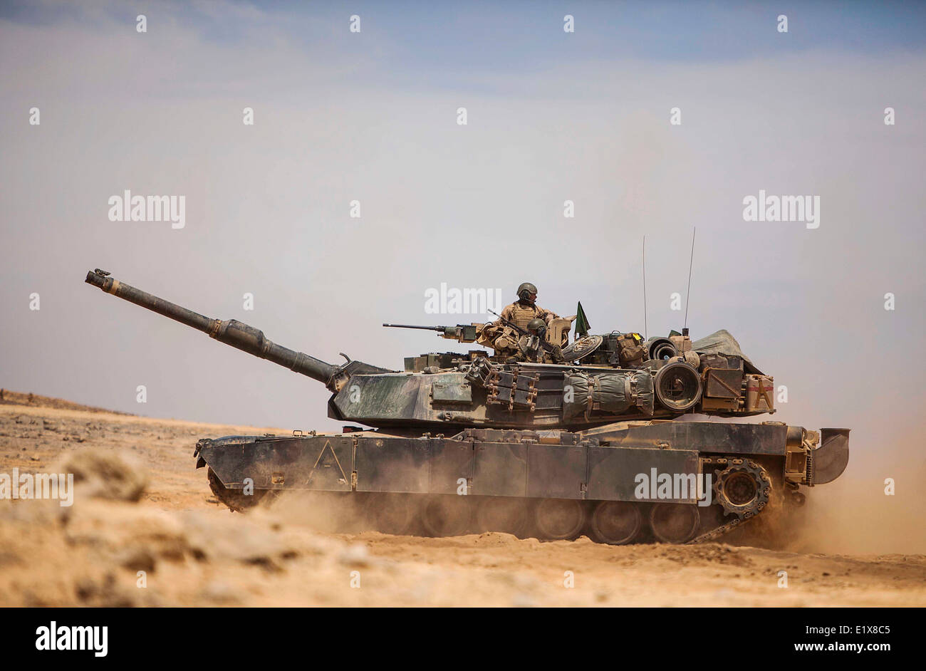 A US Marine Corps M1A1 Abrams battle tank assigned to the 22nd Marine Expeditionary Unit repositions during a live-fire exercise as part of Eager Lion May 30, 2014 in Jebel Petra, Jordan. Stock Photo