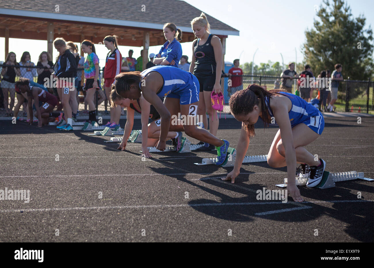 High school athletes compete in a track and field meet in Milwaukee, Wisconsin, USA. Stock Photo