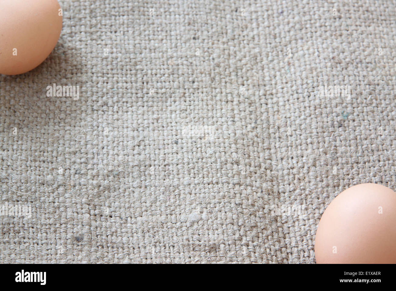 Focus eggs on sackcloth of background. Stock Photo