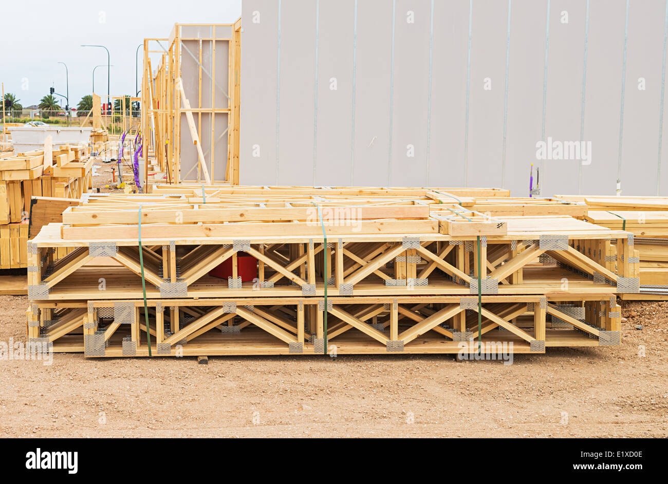 stack of wooden joists and building lumber at construction cite Stock Photo