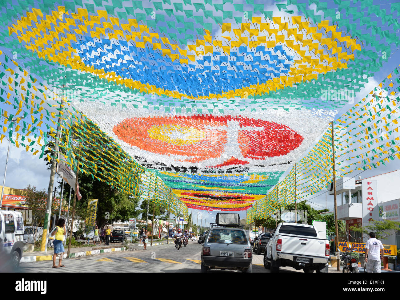 Porto Seguro, Brazil. 10th June, 2014. Coloured flags hang above a street in Porto Seguro, Brazil, 10 June 2014. The FIFA World Cup will take place in Brazil from 12 June to 13 July 2014. Credit:  dpa picture alliance/Alamy Live News Stock Photo