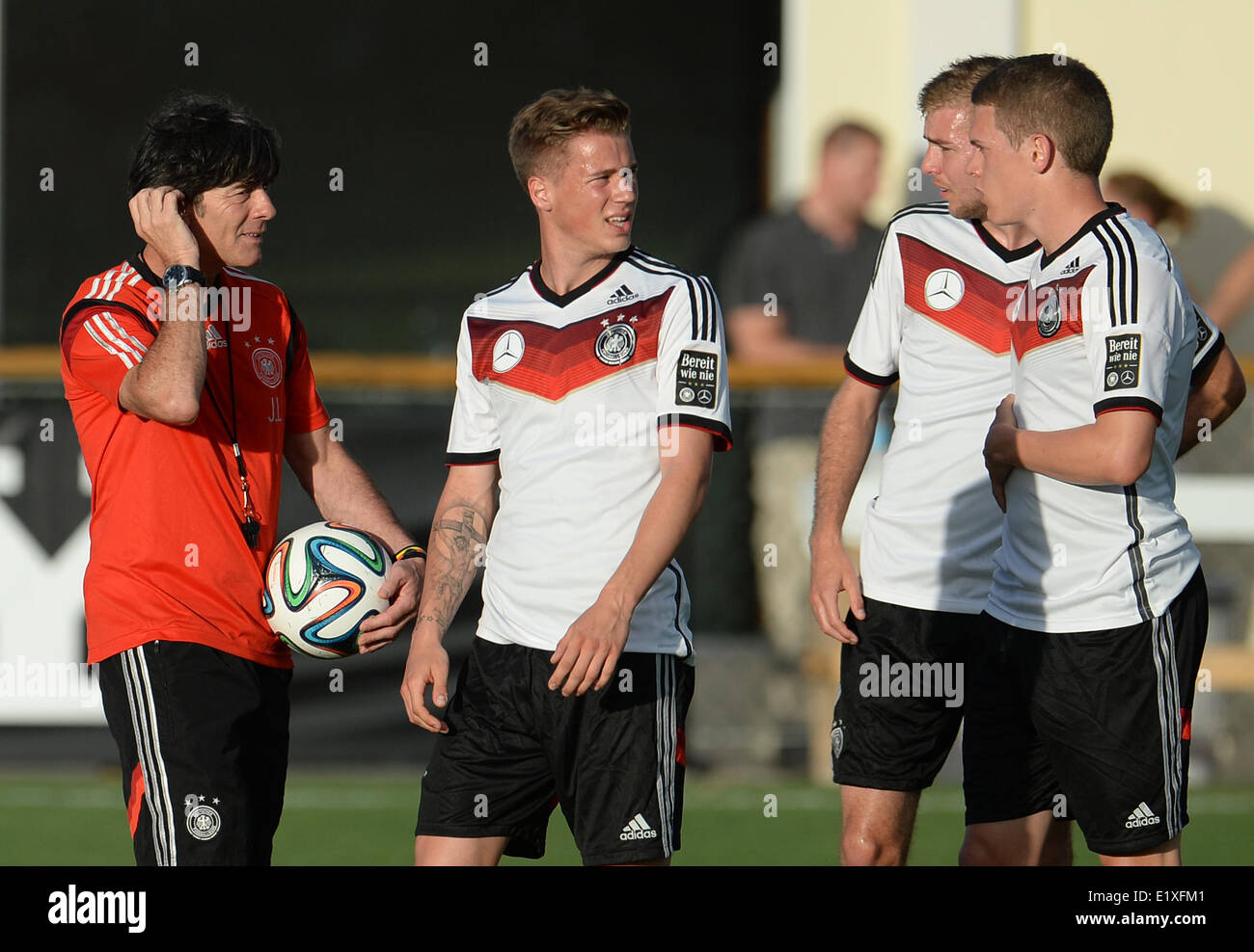 Head coach Joachim Loew (from L) talks to Erik Durm, Christoph Kramer and Matthias Ginter of the German national soccer team attend a training in Santo Andre in Brazil, 10 June 2014. The FIFA World Cup 2014 will take place in Brazil from 12 June to 13 July 2014. Photo: Andreas Gebert/dpa Credit:  dpa picture alliance/Alamy Live News Stock Photo