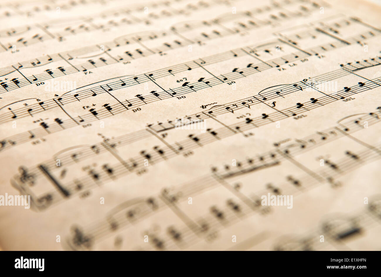 Low angle view of an old yellowed aged music score Stock Photo