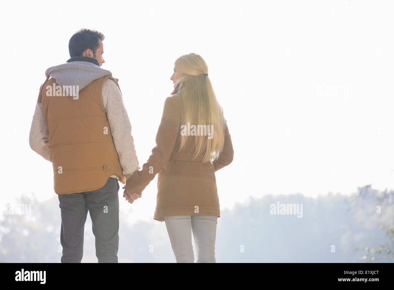 Couple holding each other hands hi-res stock photography and images - Alamy