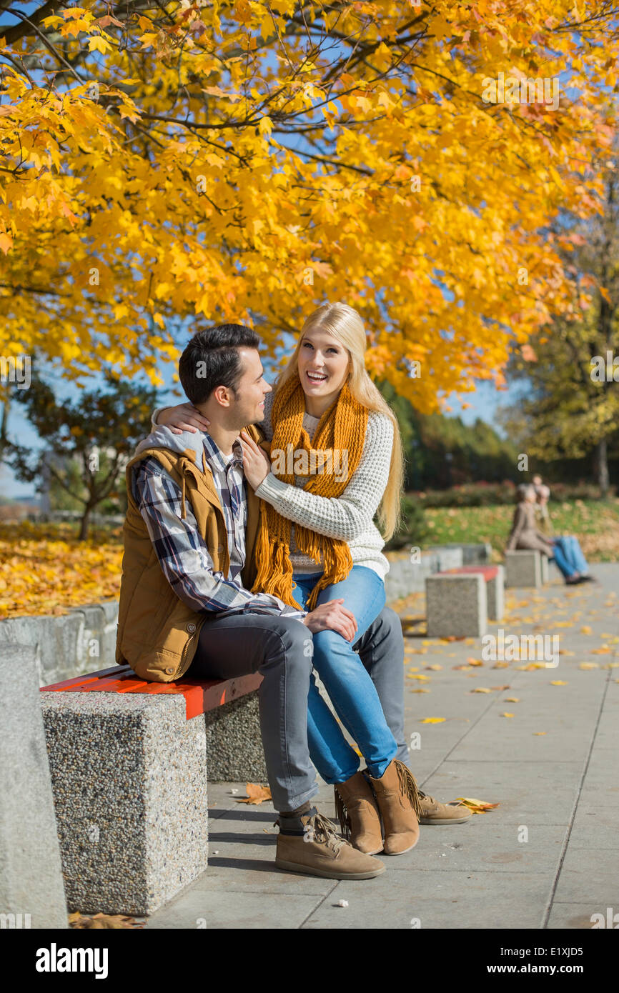 Girl Sitting On Boy Lap