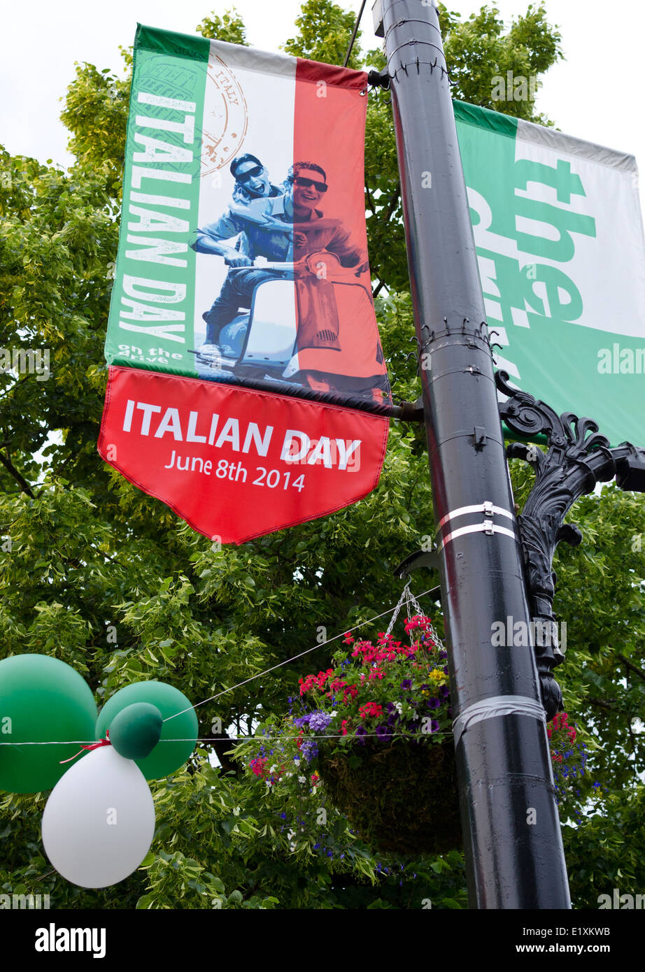 Colourful banners for Italian Day on Commercial Drive, June 8th 2014 in Vancouver Canada.  Street festival car-free day. Stock Photo