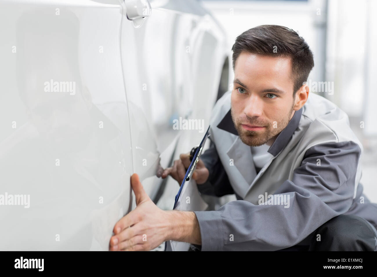 Car mechanic clipboard in repair hires stock photography and images