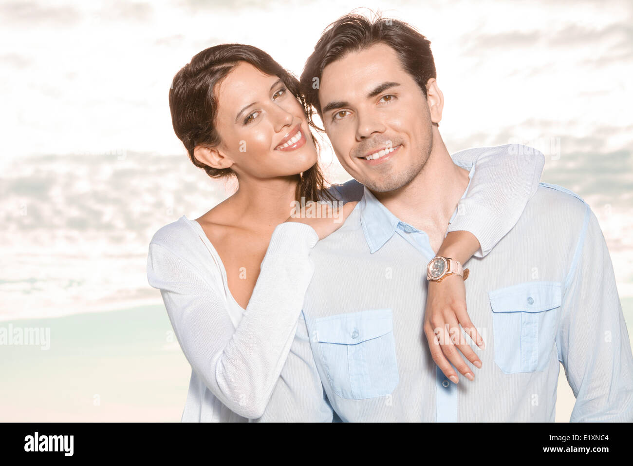 Young man arm around woman hi-res stock photography and images - Alamy