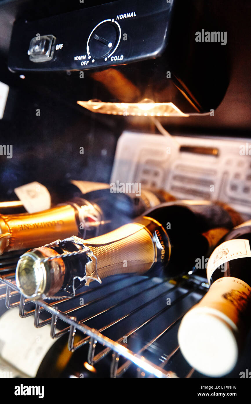 Champagne bottles in a fridge Stock Photo Alamy