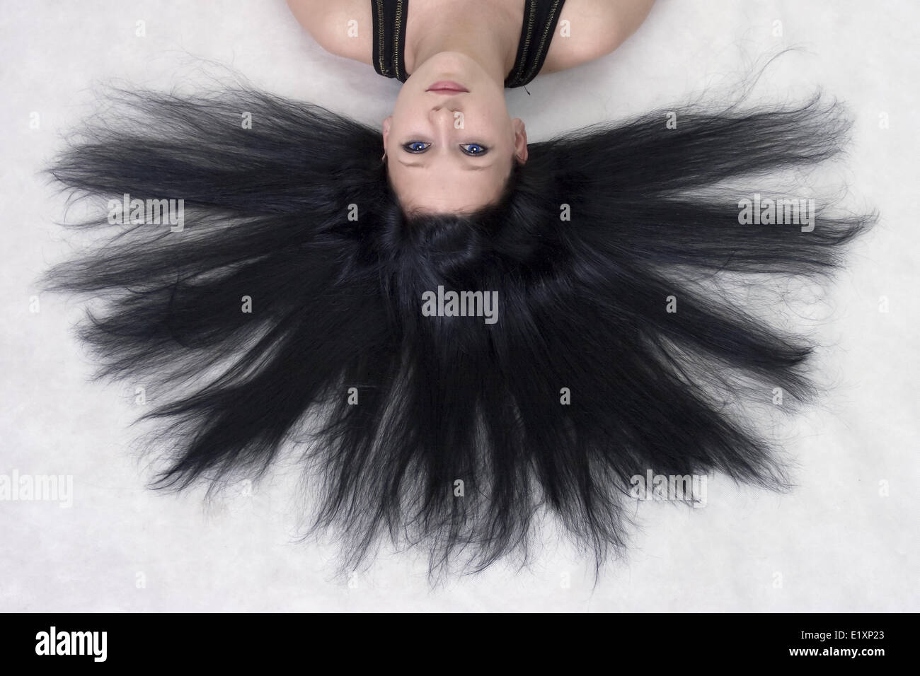 Female long straight black hair hi-res stock photography and images - Alamy