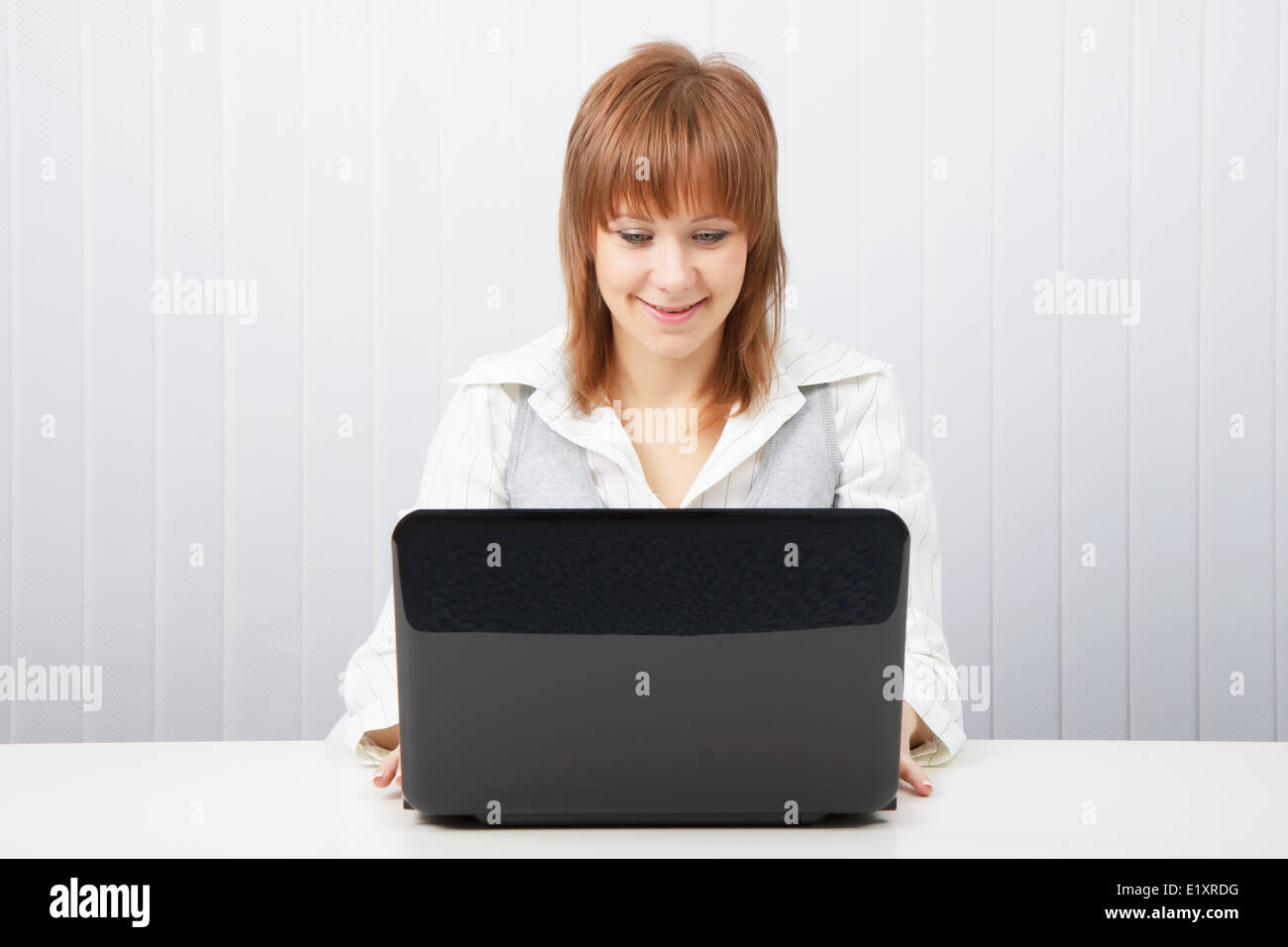 happy girl with a laptop Stock Photo - Alamy