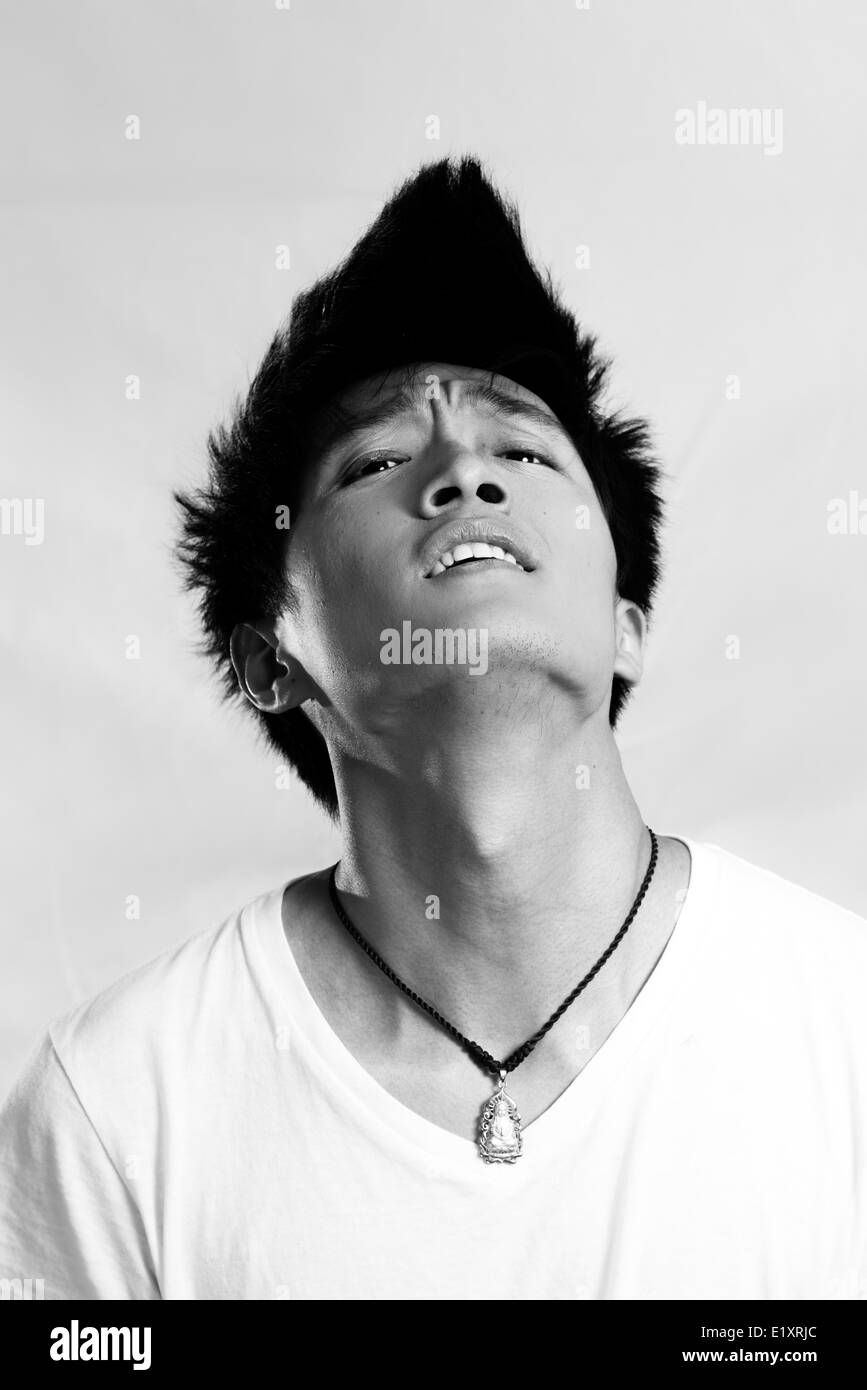 Young man looking upset Stock Photo - Alamy
