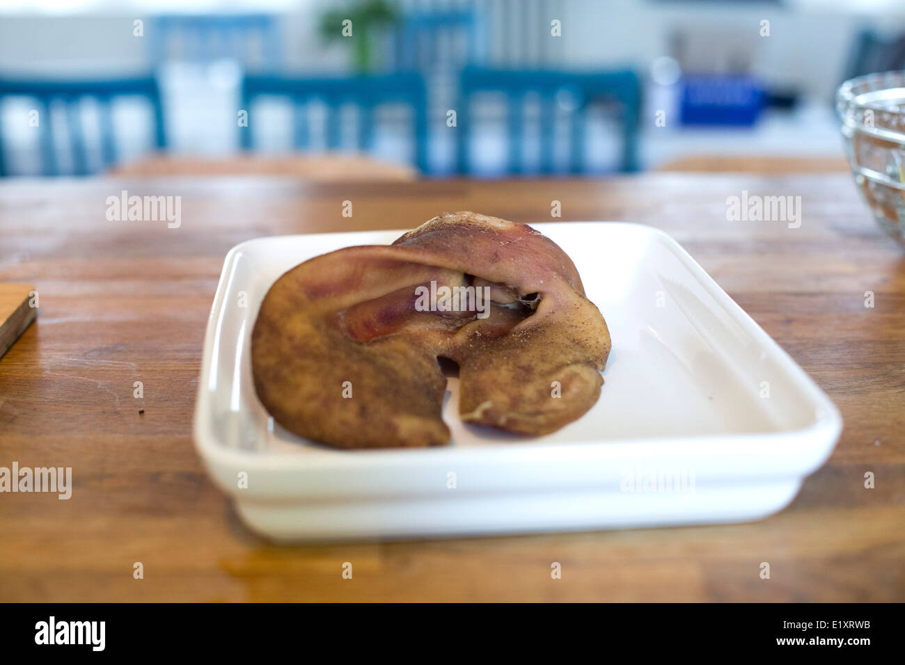 Pig's ear delicacy eating dish pork cooking cook Stock Photo Alamy