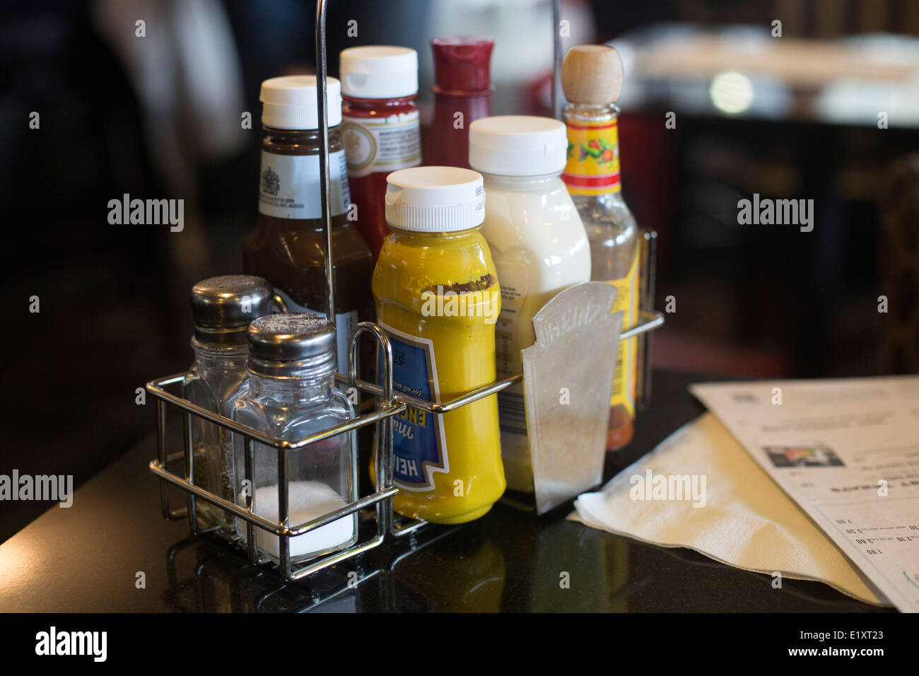 Condiments sauces on lunch table rack sauce Stock Photo