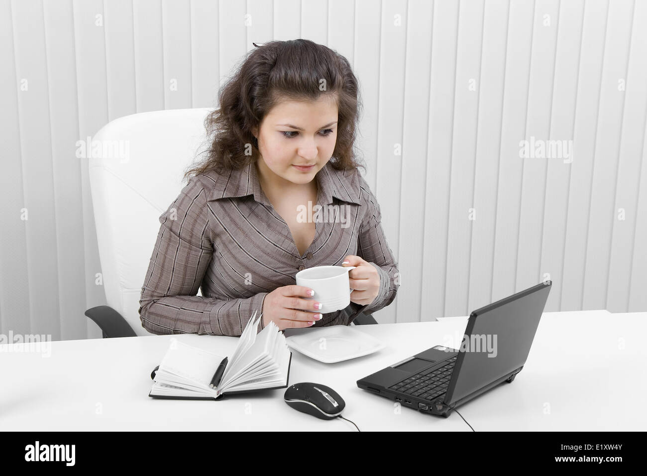 The young business woman at office Stock Photo - Alamy