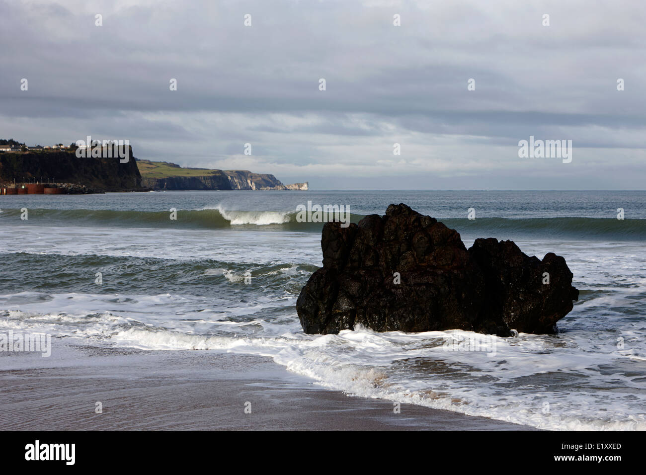 large rock on ballycastle beach in winter county antrim northern ireland Stock Photo