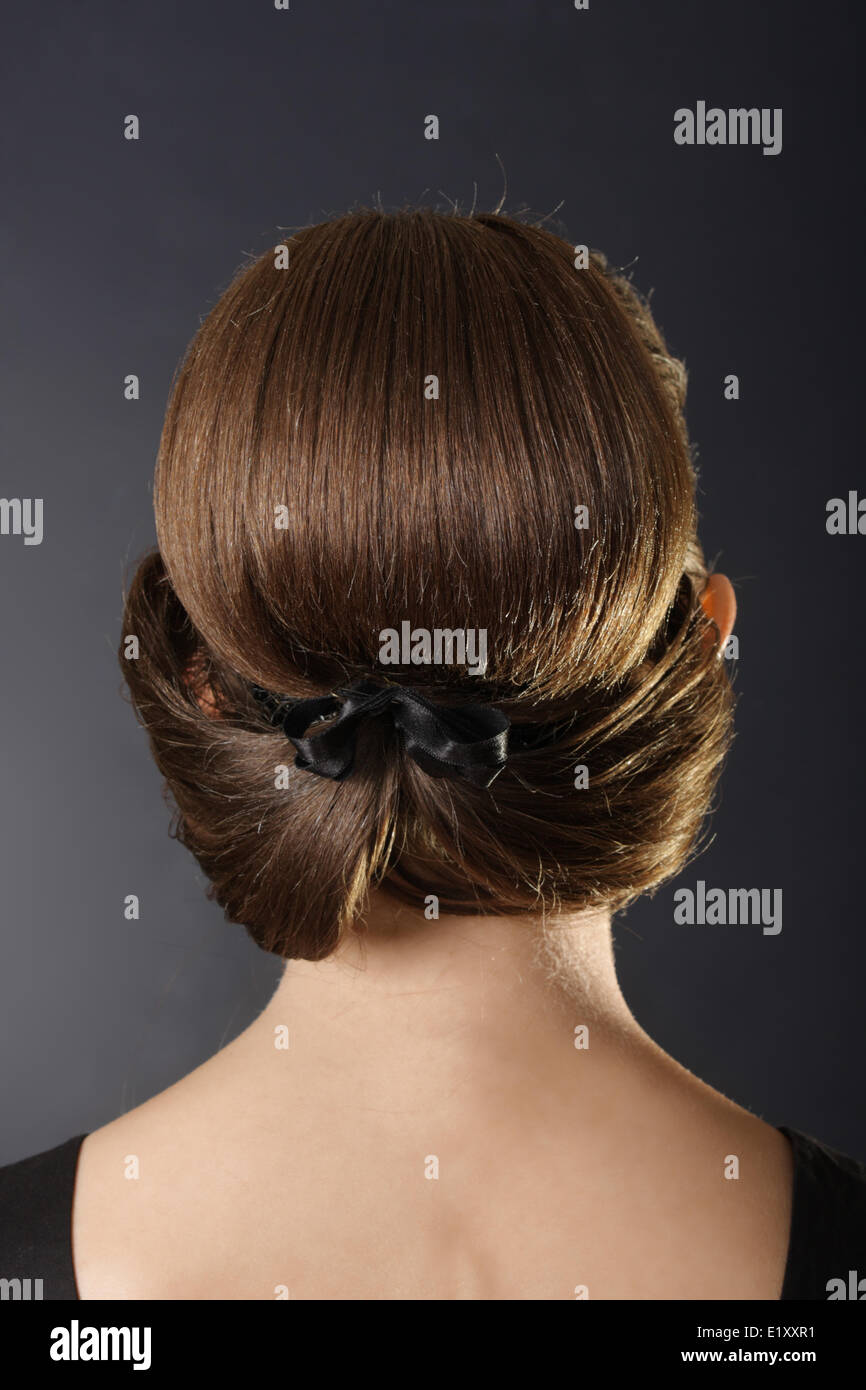 Louis Vuitton Paris Backstage Ready to Wear Autumn Winter A female a  backcombed bouffant hairstyle, light brown pencilled Stock Photo - Alamy