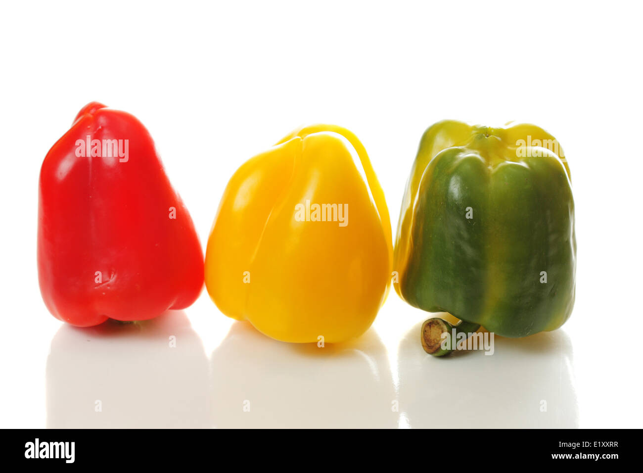 Three colored paprikas Stock Photo Alamy
