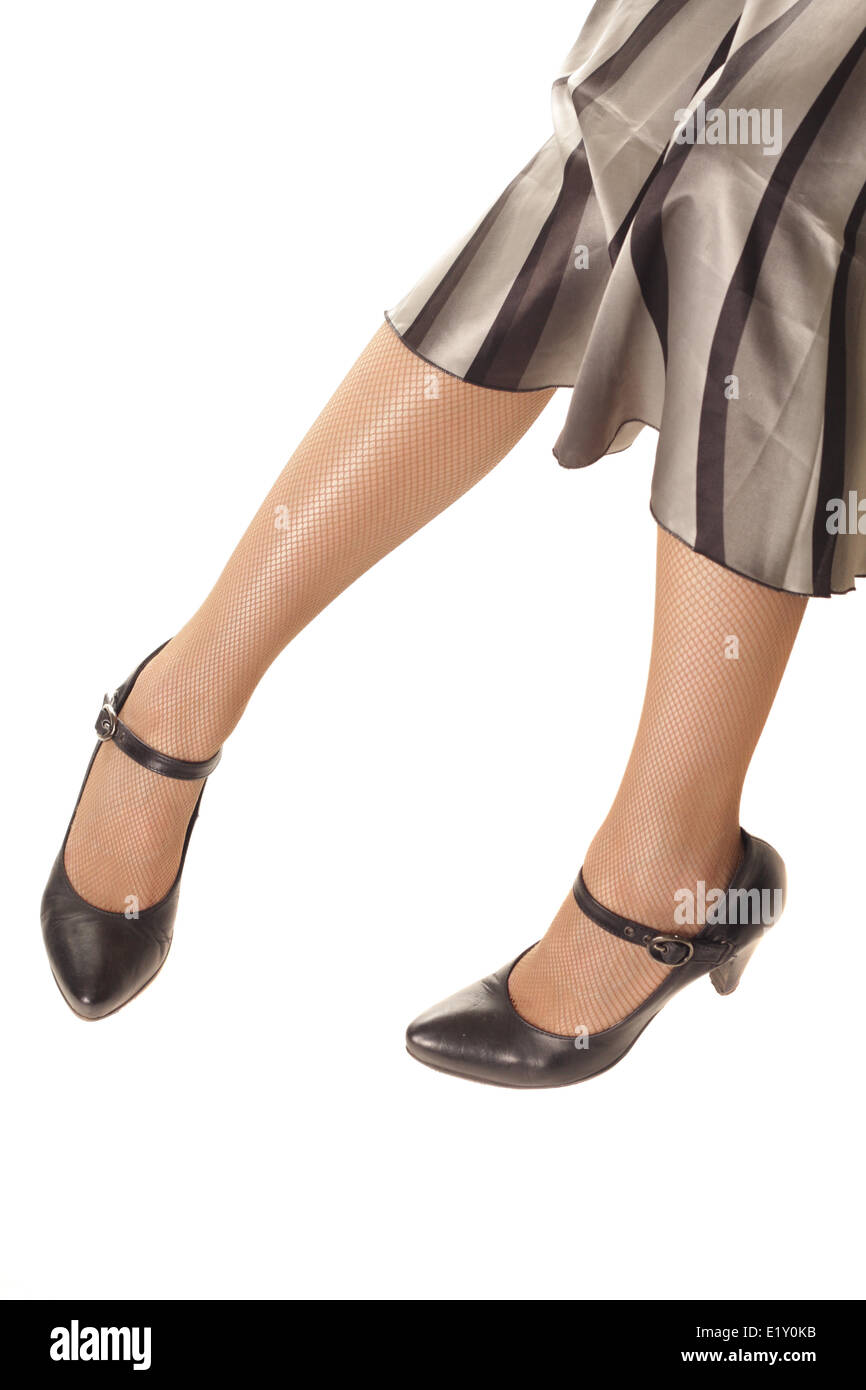 Woman legs in black shoes Stock Photo