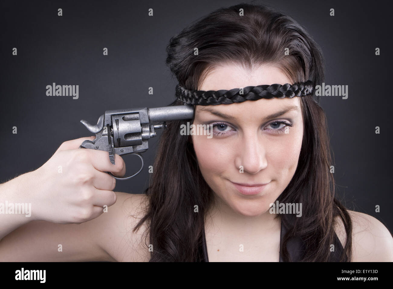 Gun At Womans Head Stock Photo Alamy