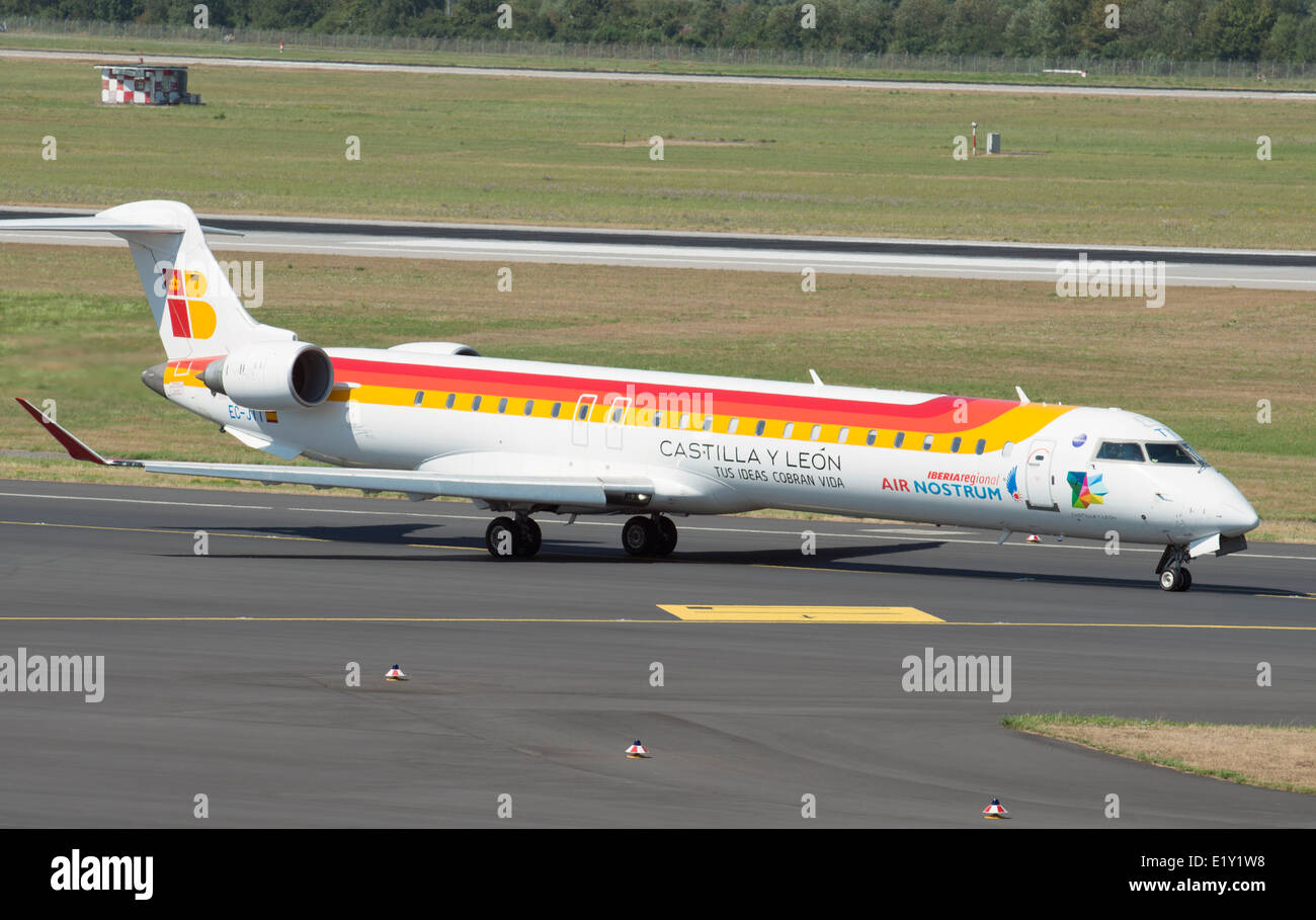 Iberia Regional airliner, Taxiing to runway at Dusseldorf International airport, Germany. Stock Photo