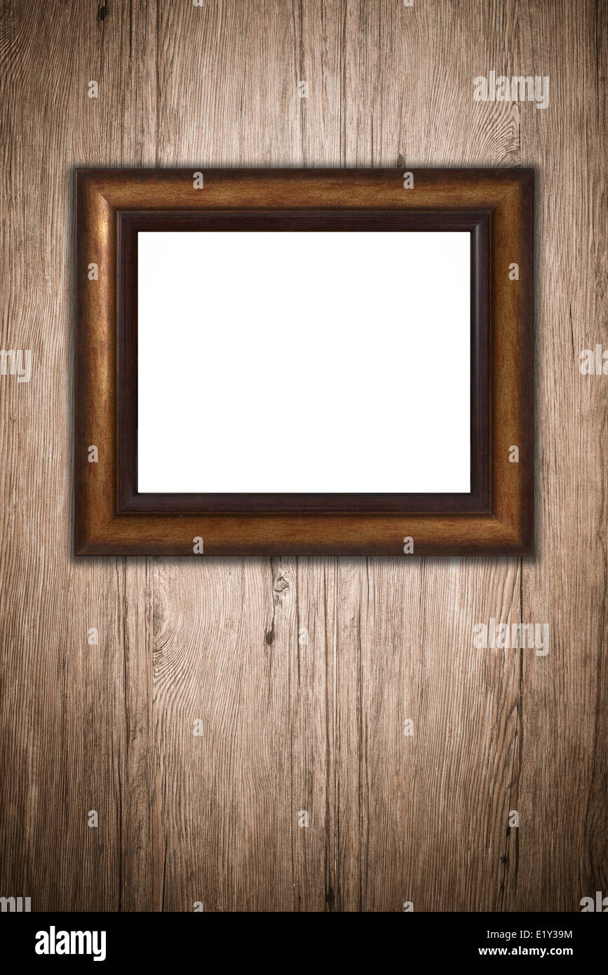 Old picture frame on vintage wood wall Stock Photo - Alamy