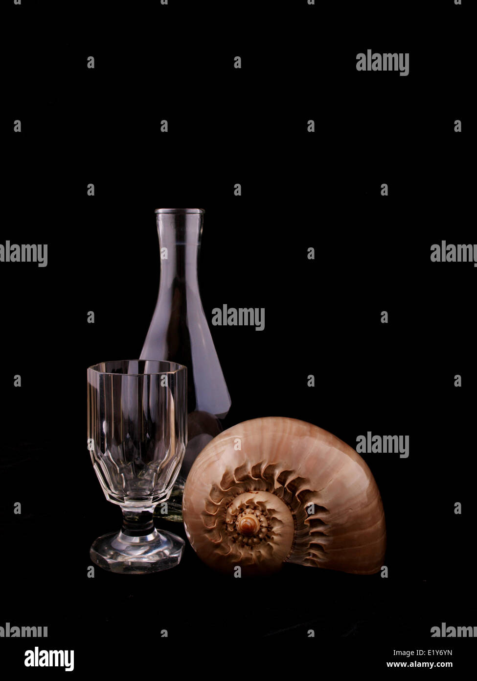 decanters, glasses, mussels in black Stock Photo