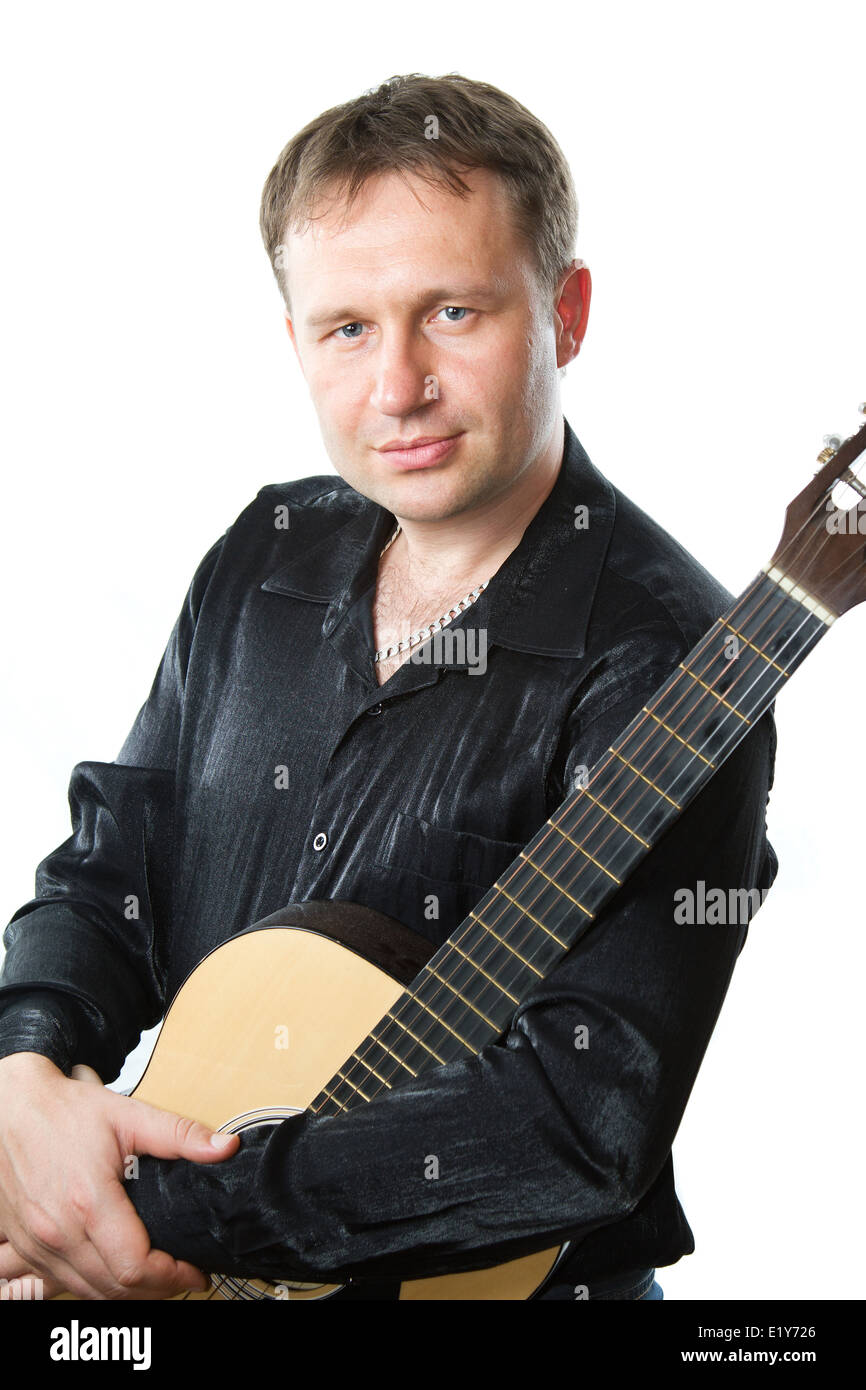 Guitarist and acoustic sixstring guitar isolated on white. Musical