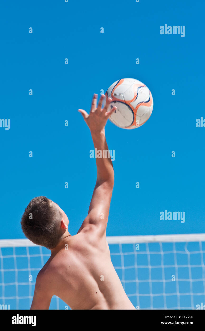 Young boy beach volleyball hires stock photography and images Alamy