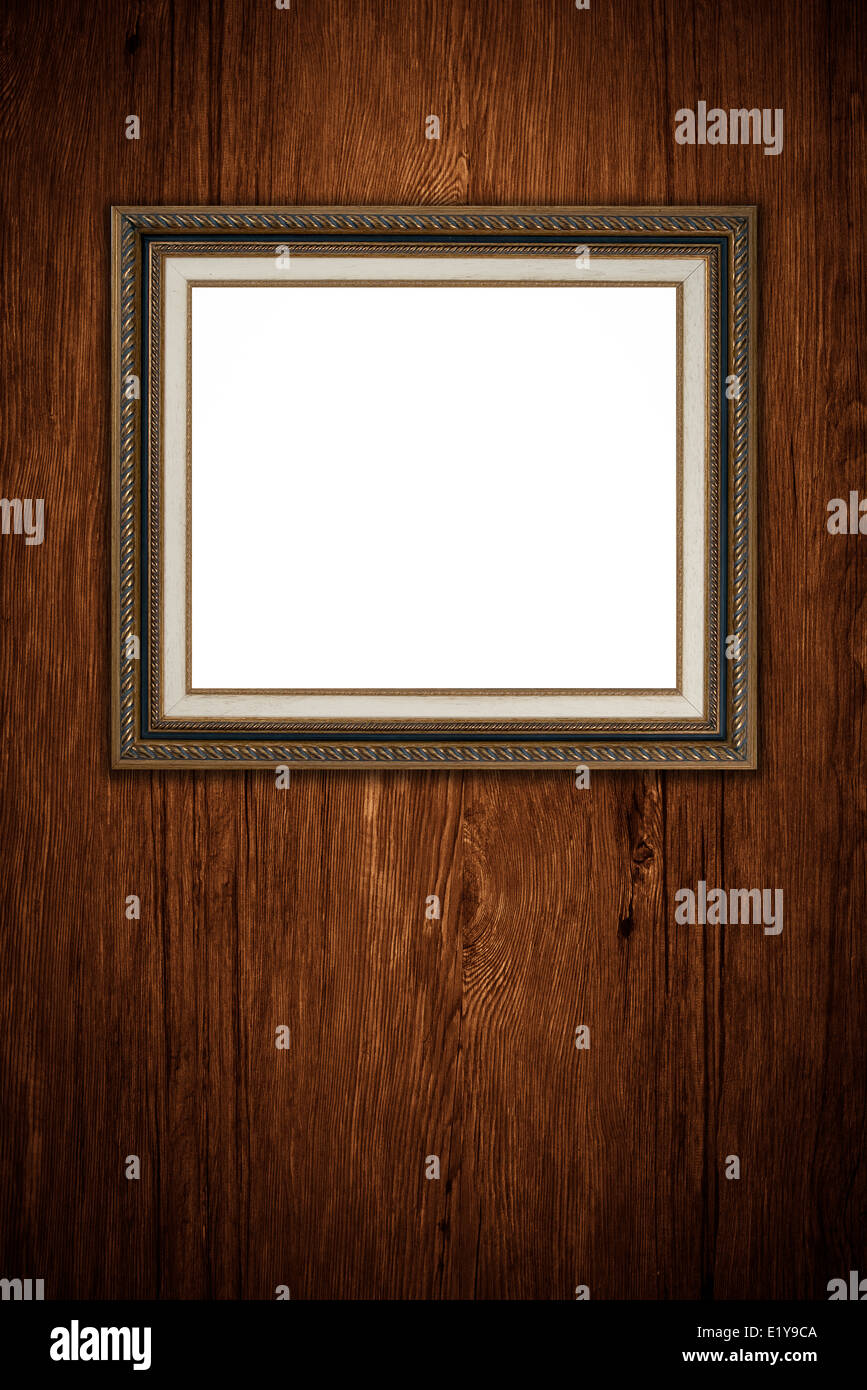 Old picture frame on vintage wood wall Stock Photo - Alamy