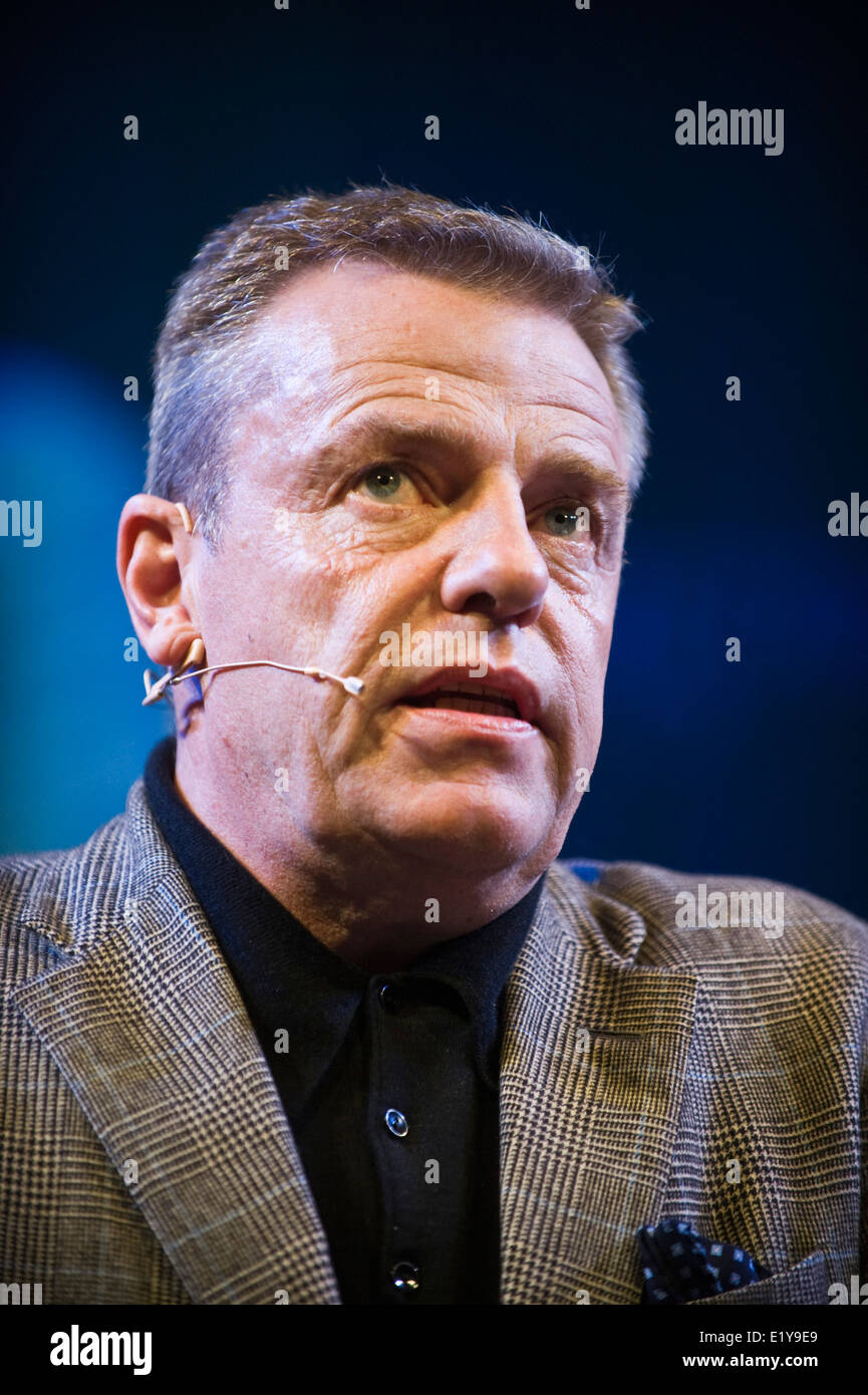 Suggs talking about his early life and years as a musician on stage at