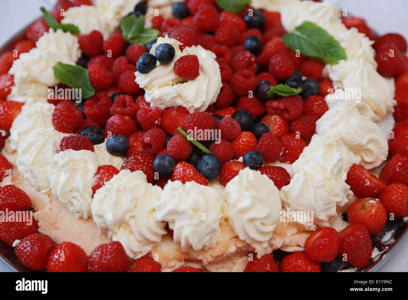 Raspberry and Strawberry Pavlova Stock Photo Alamy