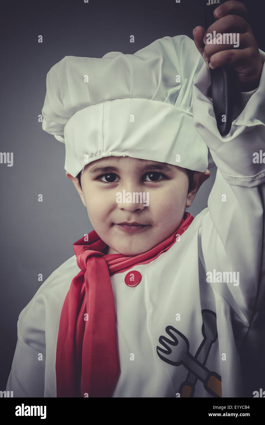nutrition, child dress funny chef, cooking utensils Stock Photo Alamy
