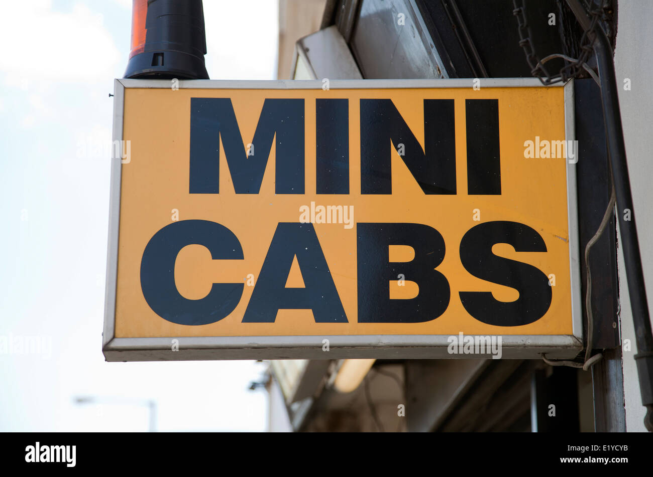 Mini Cabs Sign - UK Stock Photo